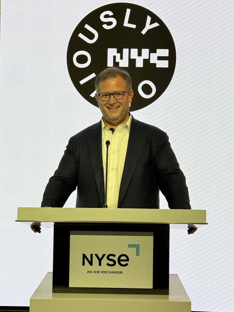 Oliver ringing the opening bell at the New York Stock Exchange
