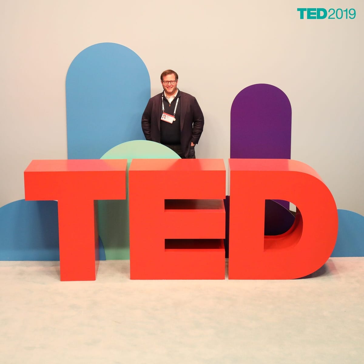 Oliver Libby on stage at TED 2019